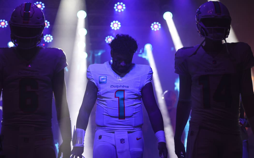 Tua Tagovailoa #1 of the Miami Dolphins walks out for warmups.