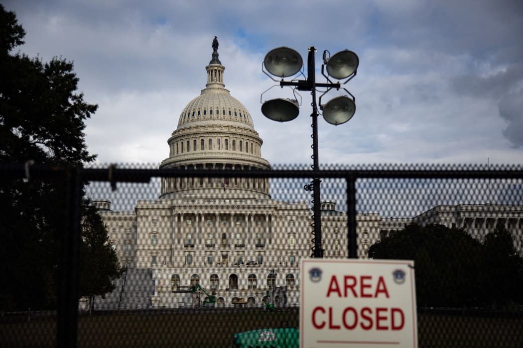 The US Capitol behind newly-erected high security fences ahead of the 'Justice for J6' rally.