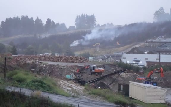 The smouldering fire in the Dunedin suburb of Burnside.