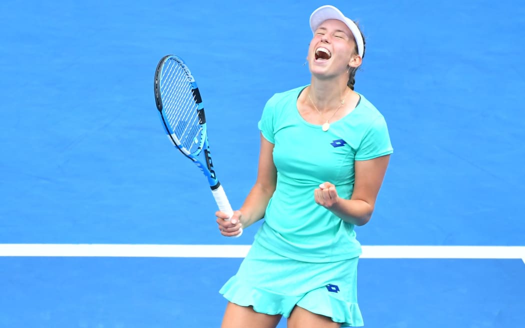 Elise Mertens celebrates winning her match at the Australian Open.