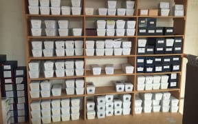 The wall of unclaimed ashes at J Weir & Co Funeral Directors in Onehunga.