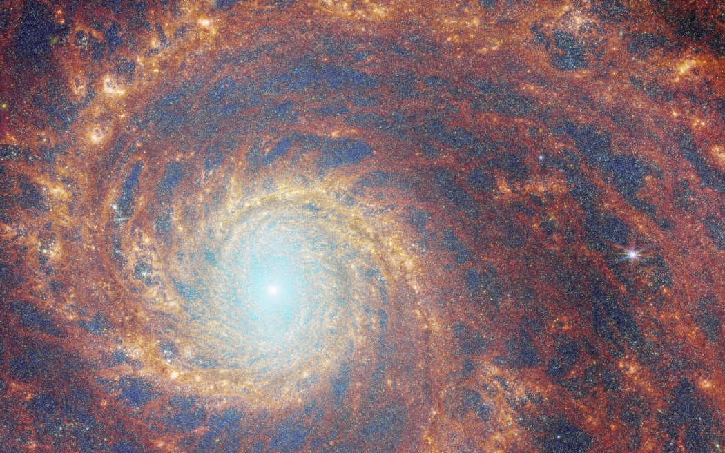 The M51 galaxy is called the Whirlpool due to its distinct spiral arms.