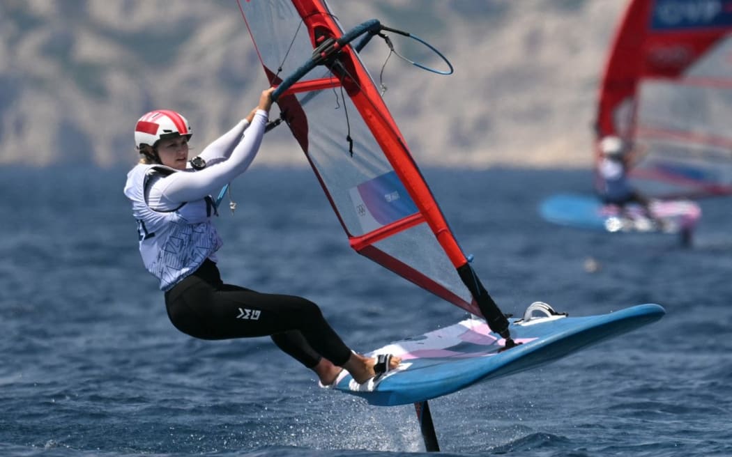 New Zealand's Veerle Ten Have competes in the marathon points race of the women’s IQFoil windsurfing event during the Paris 2024 Olympic Games sailing competition at the Roucas-Blanc Marina in Marseille on July 31, 2024. (Photo by NICOLAS TUCAT / AFP)