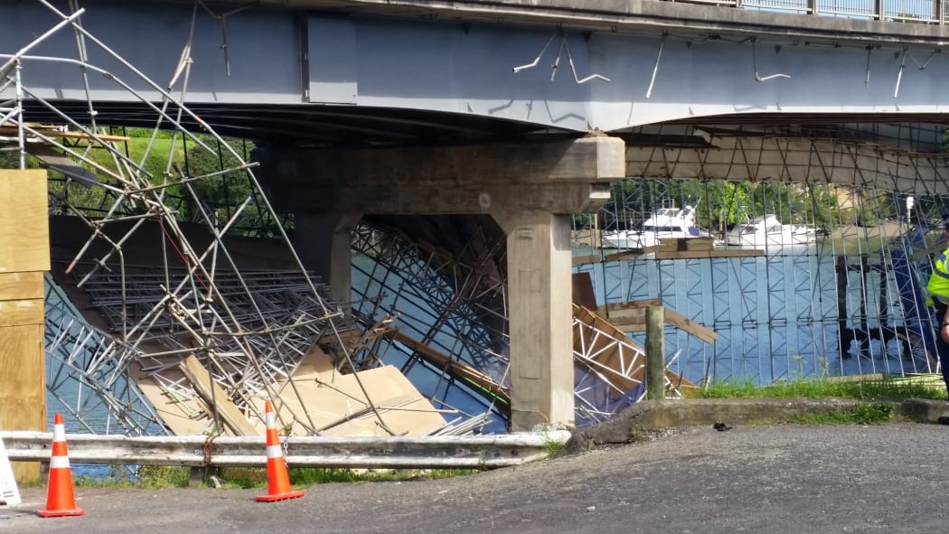The collapsed scaffolding beneath the bridge.