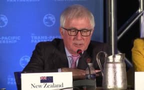 Trade Minister Tim Groser speaks at a media conference announcing the TPP deal.