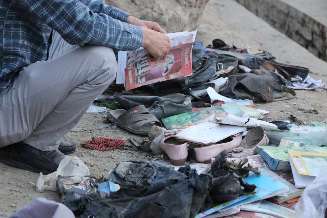 A view from the site after at least 30 people, mostly schoolgirls, have been killed in three back-to-back blasts targeting a school in Afghanistan's capital Kabul on 8 May 2021.
