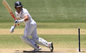 Ollie Pope of England plays a shot during Day 4 of the Third Men’s Ashes Test between Australia and England at the Adelaide Oval in Adelaide.