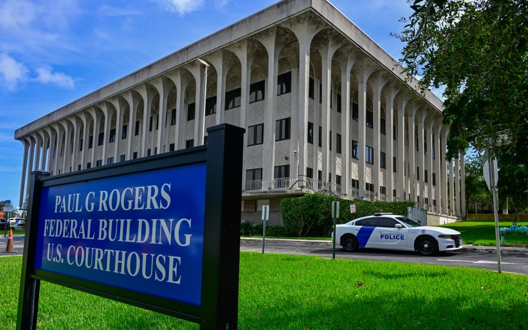 A view of the Paul G. Rogers Federal Building and US Courthouse during a hearing on the detention of Ryan Wesley Routh, suspected of the attempted assassination of former US president Donald Trump, in West Palm Beach, Florida, on September 30, 2024. Ryan Wesley Routh, 58, was charged with possession of a firearm as a convicted felon and possession of a firearm with an obliterated serial number at his initial court appearance. (Photo by Giorgio VIERA / AFP)