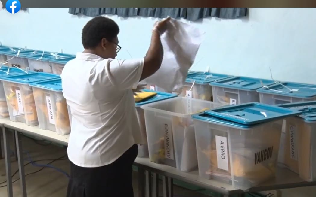 Collecting a new box of envelopes from the back of the hall. All the action was livestreamed for the people of Vanuatu, and the world.