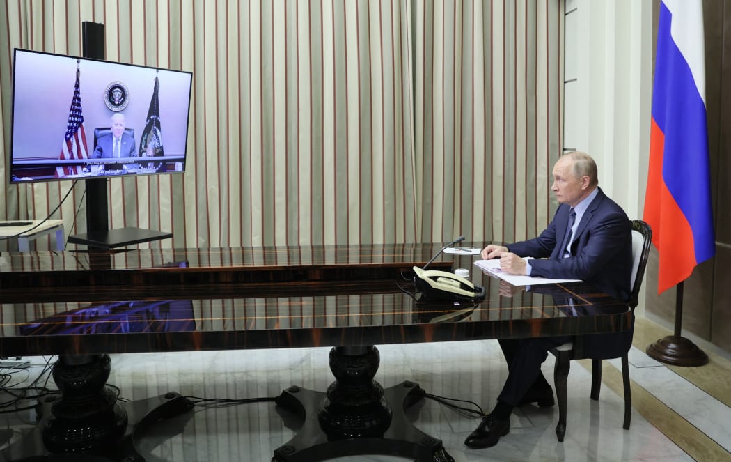 Russian President Vladimir Putin meets US President Joe Biden via a video conference in Sochi, Russia.