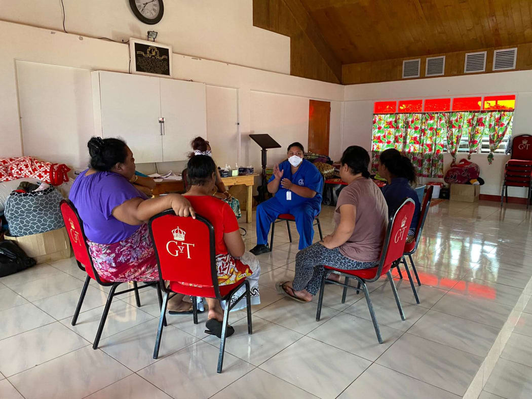 PACMAT nurse Seini Faleata in a therapy talk with women from Atata,