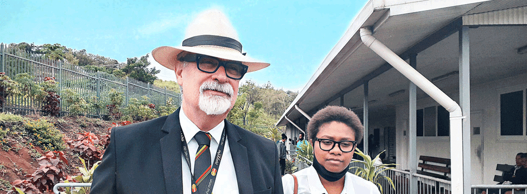 Greg Sheppard (left) has worked as a lawyer in Papua New Guinea for years