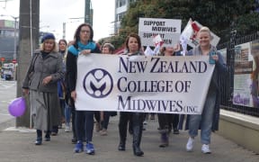 Midwifes march in Wellington for pay equity.