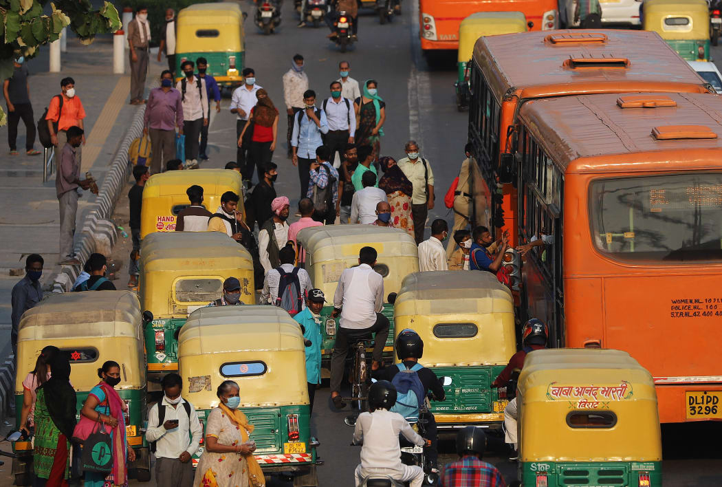 A crowded road near in New Delhi, India on 9 September. Cases and deaths from Covid-19 have soared in India.