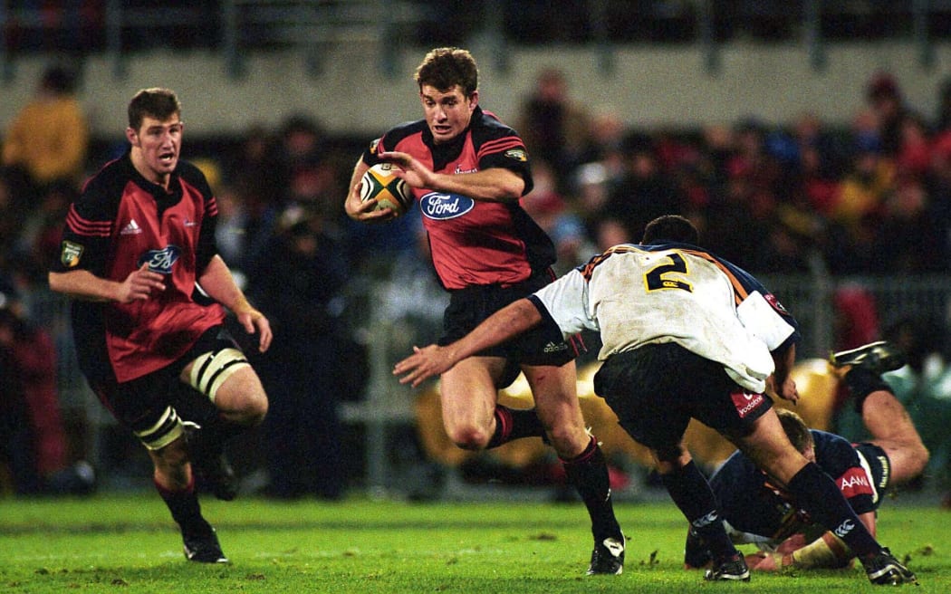 Mark Robinson in action during the rugby union Super 12 final between the Crusaders and Brumbies, Jade Stadium, Christchurch, 25 May, 2002. Photo: PHOTOSPORT