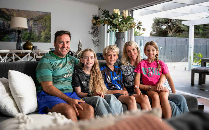Jon, Eve Brady, Juliet and Charlotte Dale (left to right) photographed in their living room.
