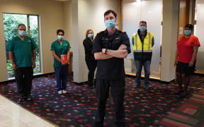 Staff at the Waipuna Hotel, Mt Wellington, Auckland. Several asked for their full names to be protected: (from left) nurses John and Vicki; workforce coordinator Tash, managed isolation facility manager Lieutenant Sam Wilson, site security manager Stuart. and hotel manager Shakira.