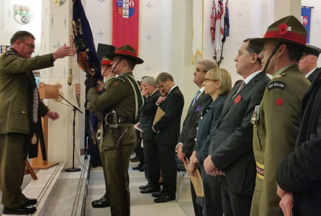 Bad weather forced the commemoration inside the carillon at Pukeahu National War Memorial Park.