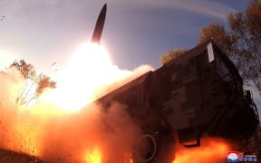 This undated picture released from North Korea's official Korean Central News Agency (KCNA) on 10 October, 2022 shows a Hokkaido missile launch training test by the Korean People's Army Tactical Nuclear Operation Unit at an undisclosed location.