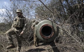 Ukrainian soldiers preparing weapons at the southern front near Kherson on 15 July, 2022.