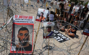 Families of Israelis held hostage in the Gaza Strip since October 2023 demonstrate in Tel Aviv's 'Hostage' square during US envoy Steve Witkoff's visit on August 2, 2025. Witkoff met the anguished families as fears for the captives' survival mounted almost 22 months into the war. (Photo by Jack GUEZ / AFP)