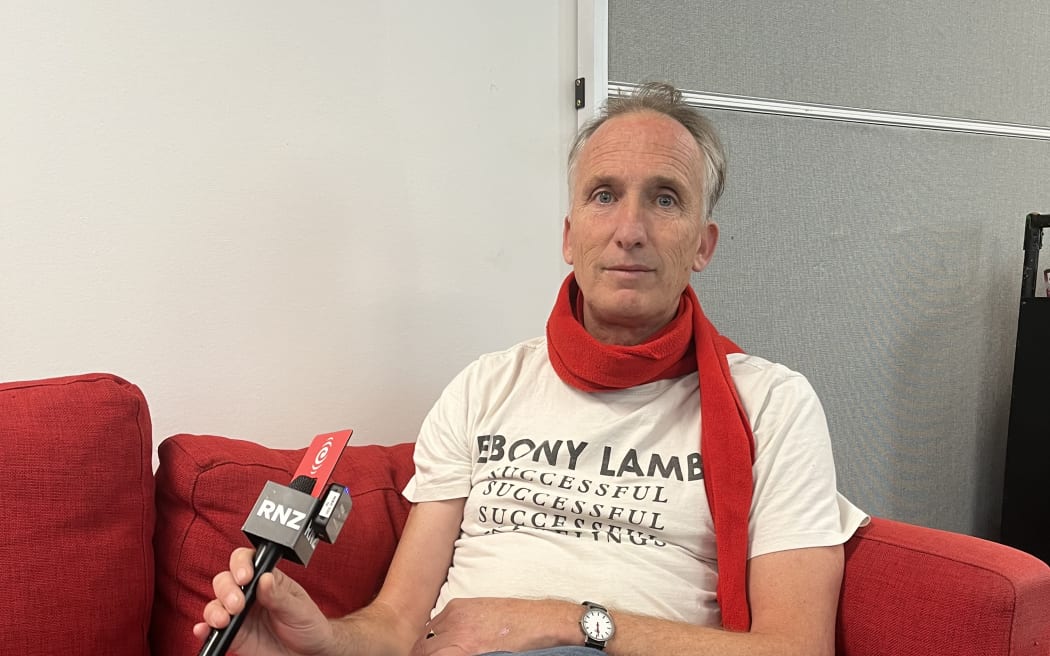 Mark Amery wearing a NZ music T-shirt for NZ Music T-shirt Day 2024