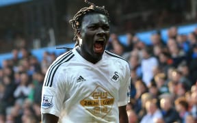 Bafetimbi Gomis of Swansea City celebrates after scoring the winning goal.