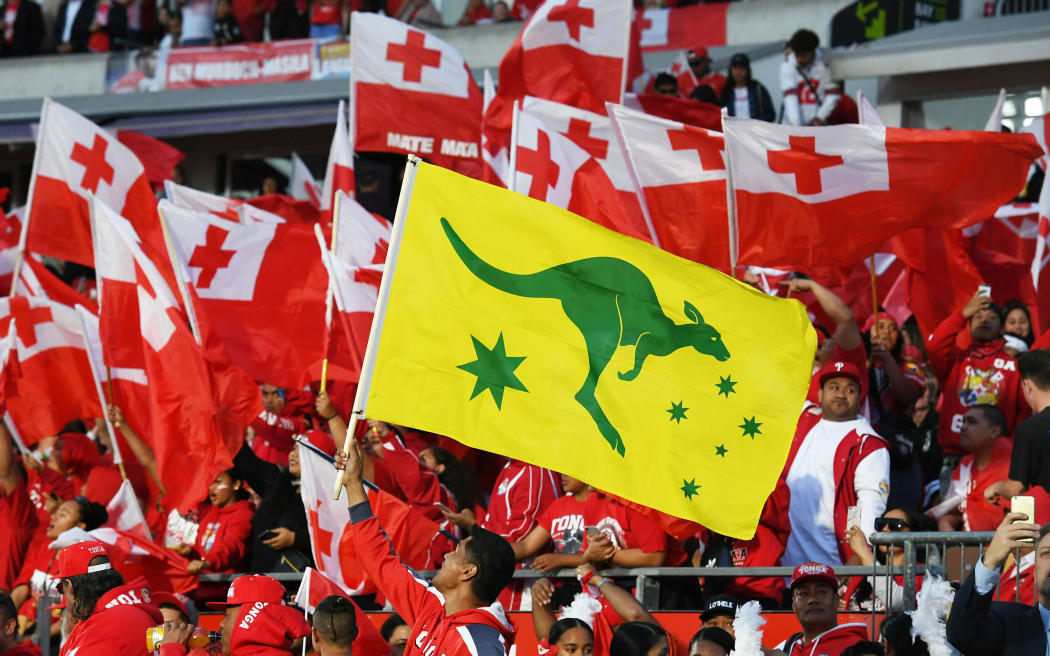 A solitary Australian flag in a sea of red.