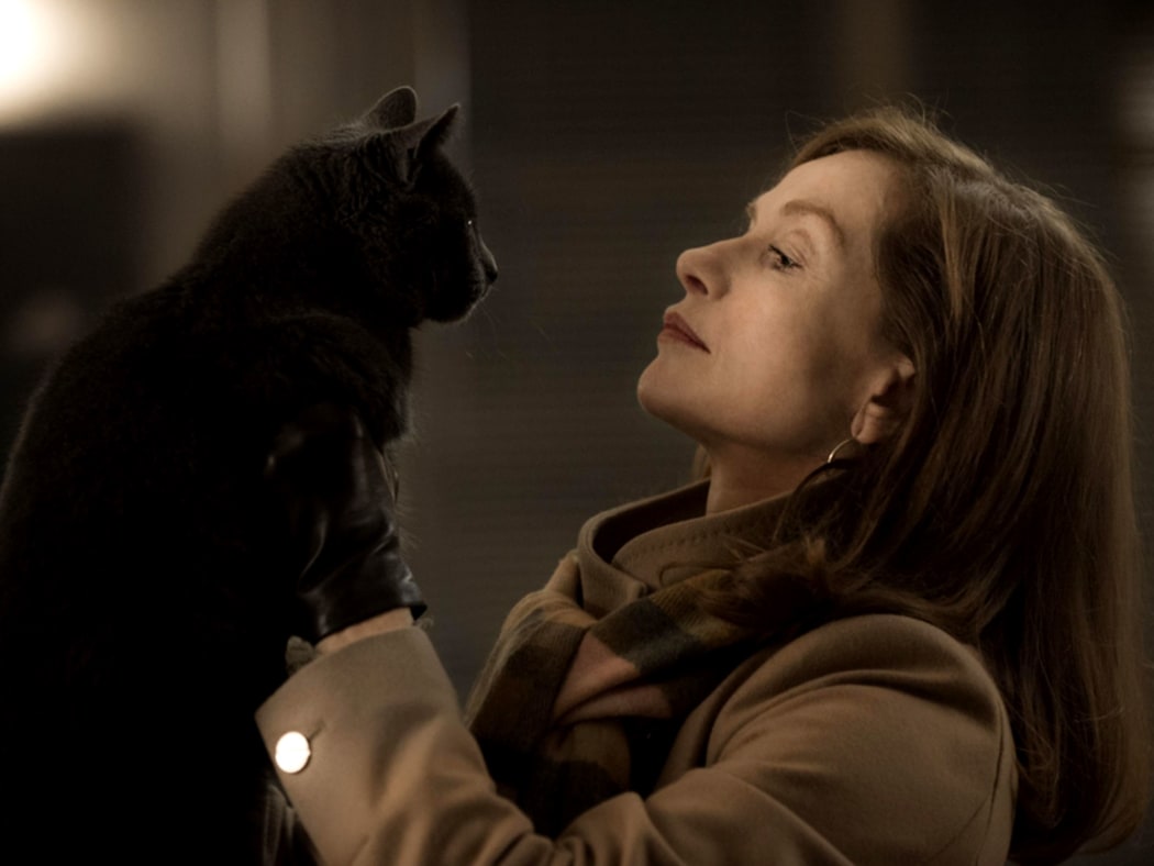 Isabelle Huppert and companion in Paul Verhoeven’s Elle