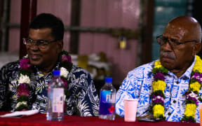 Leader of the National Federation Party Biman Prasad, left, and SODELPA leader Sitiveni Rabuka.