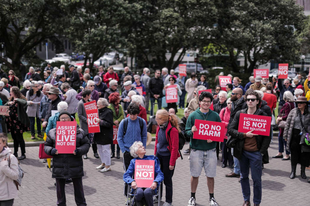 Protesters against the Euthanasia Bill gather outside Parliament.