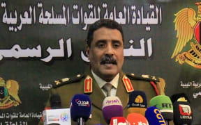 Ahmad al-Mesmari, spokesman for Haftar's forces, addresses the media in the eastern Libyan city of Benghazi.