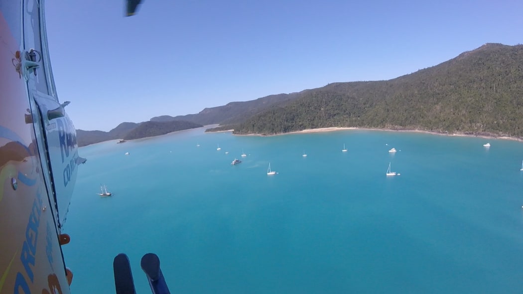 The RACQ CQ Rescue helicopter on the flight to rescue a shark victim at the Whitsunday Islands in Australia.