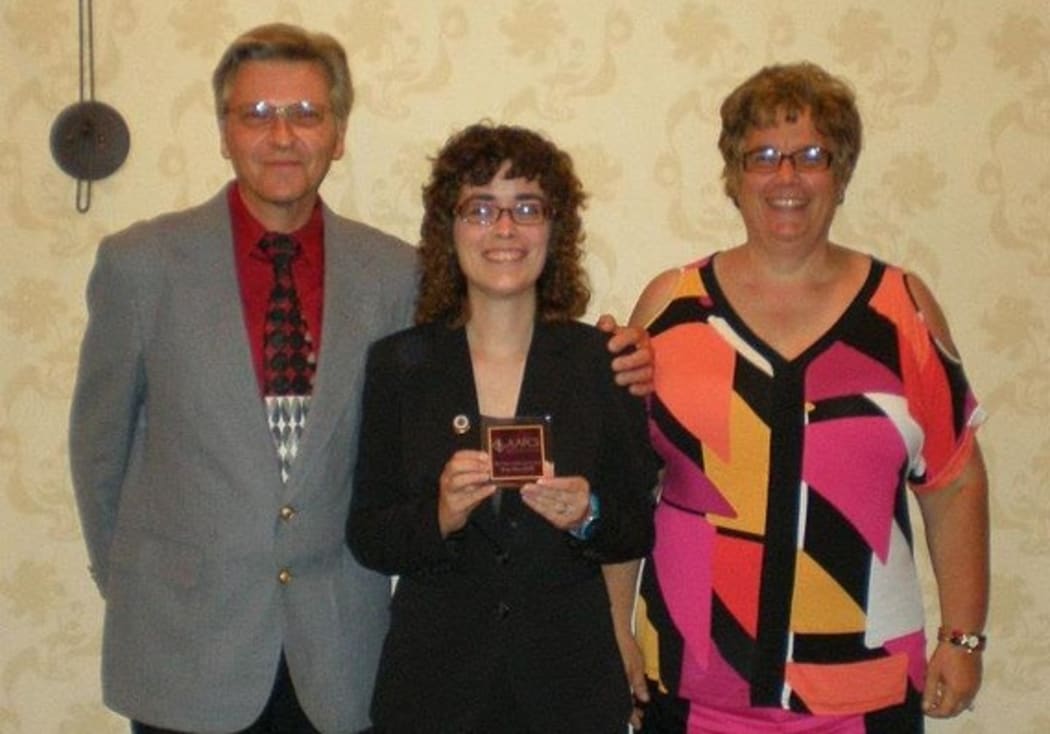 Axton Betxz-Hamilton and her Mum at award ceremony for her work on identity theft