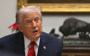 US President Donald Trump speaks during a roundtable discussion in the Roosevelt Room of the White House in Washington, DC, on December 10, 2025.
