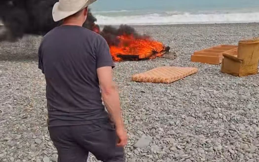 A screenshot of the video posted to social media shows the fire on Dorie Beach near Rakaia, Canterbury.