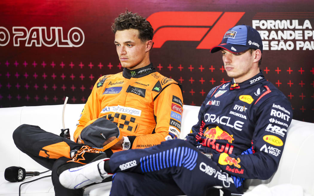 Lando Norris (L) and Max Verstappen.