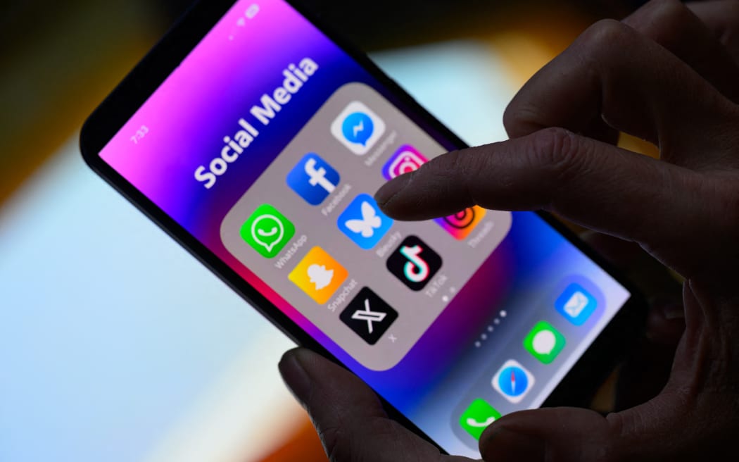 Social media icon applications appear on a mobile phone in this photo illustration in Brussels, Belgium, on March 16, 2025.