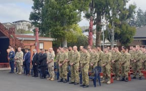Defence force personnel are greeted with a powhiri at Hui Te Rangiora Marae in Hamilton.