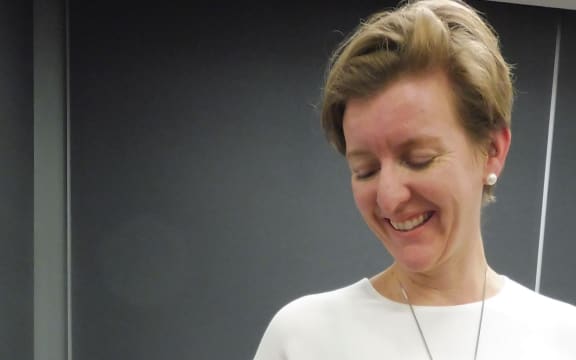 Seven-year-old Charles, pictured with his mum Belinda, has two cochlear implants which have restored his ability to hear to the point that he can play music and learn Chinese.