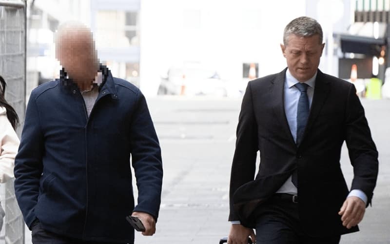 The former political figure arrives at court.