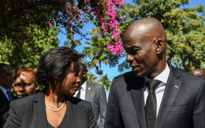 This picture of President of Haiti Jovenel Moïse (R) and first lady Martine Moïse (L) was taken last year for the official ceremony of Haiti's 10th earthquake anniversary in Port-au-Prince.