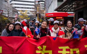 Members of Wellington's Chinese community welcoming Premier Li Qiang