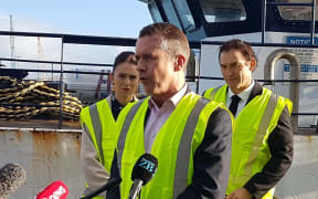 Sanford chief executive Volker Kuntzsch speaking at the announcement on cameras on fishing boats by PM Jacinda Ardern, left, and Fisheries Minister Stuart Nash, right.