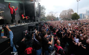 Singer Felix Brummer of the rock band Kraftklub from Chemnitz on stage at a concert under the motto "#we are more"  at Saxony, Chemnitz on September 3.