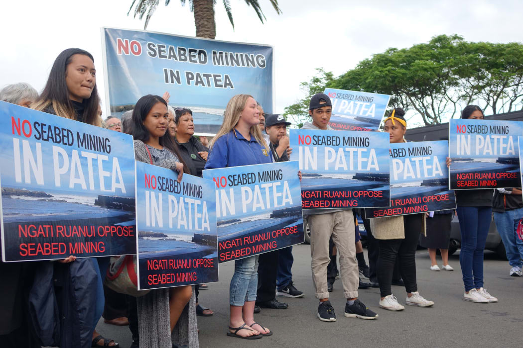 Busloads of people protested outside the Environmental Protection Agency hearing to consider Trans Tasman Resources' seabed mining application.