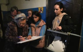 Residents cast their votes in controversial referendums in Donetsk Oblast, Ukraine on 23 September, 2022.