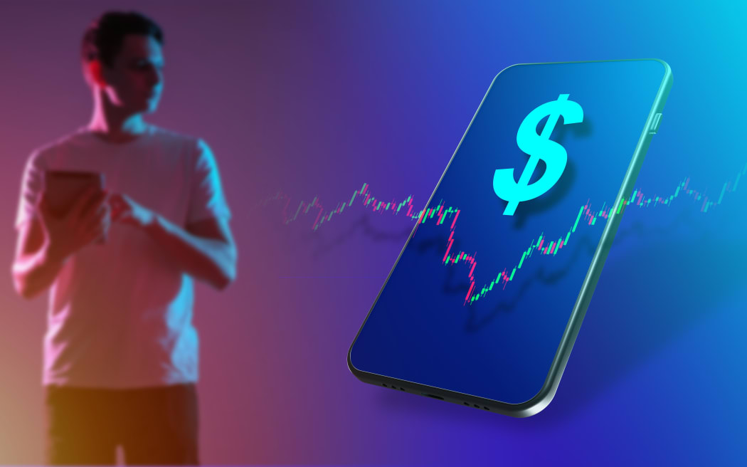 Trader with tablet. Investments through smartphone. Dollar sign on phone. It symbolizes trading in stock market. Guy trader is blurred. Concept application for trading. Investment application