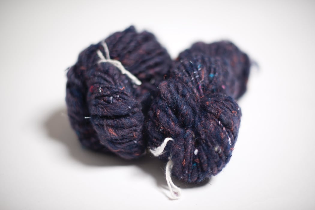 Donna Cleveland's yarn, made with recycled materials, is blended with wool to make it more workable.