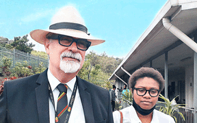Greg Sheppard (left) has worked as a lawyer in Papua New Guinea for years